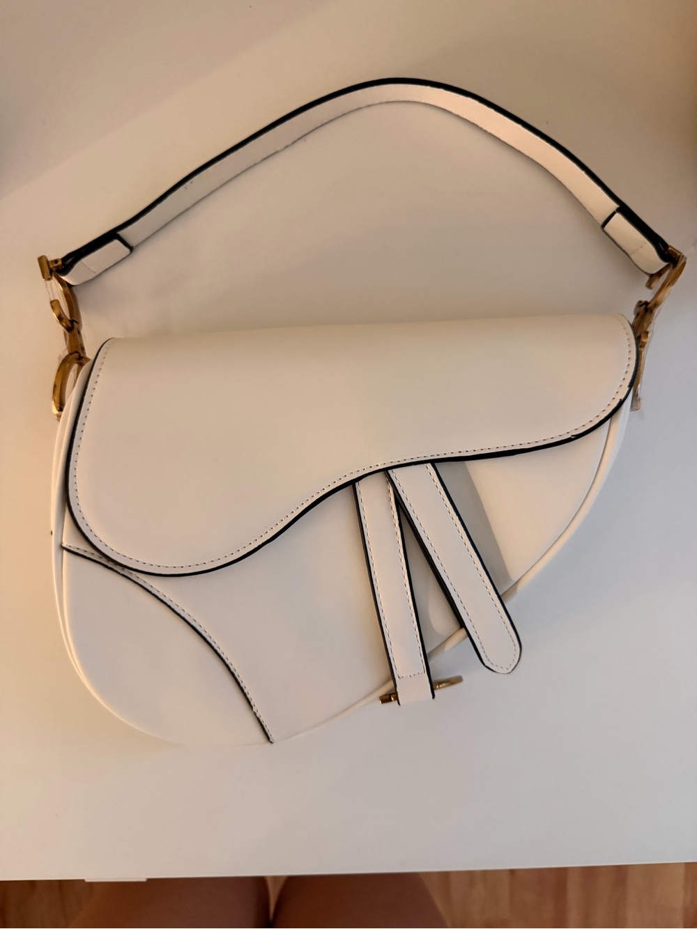 White Saddle-Style Shoulder Bag with Curved Flap
